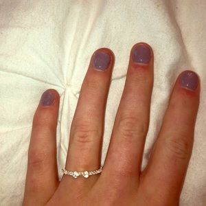 Sliver ring with a bow and silver jewels